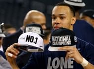 Shabazz Napier #13 of the Connecticut Huskies celebrates on the court after defeating the Kentucky Wildcats 60-54 in the NCAA Men's Final Four Championship at AT&T Stadium on April 7, 2014 in Arlington, Texas.